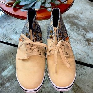 Tan and patterned vans